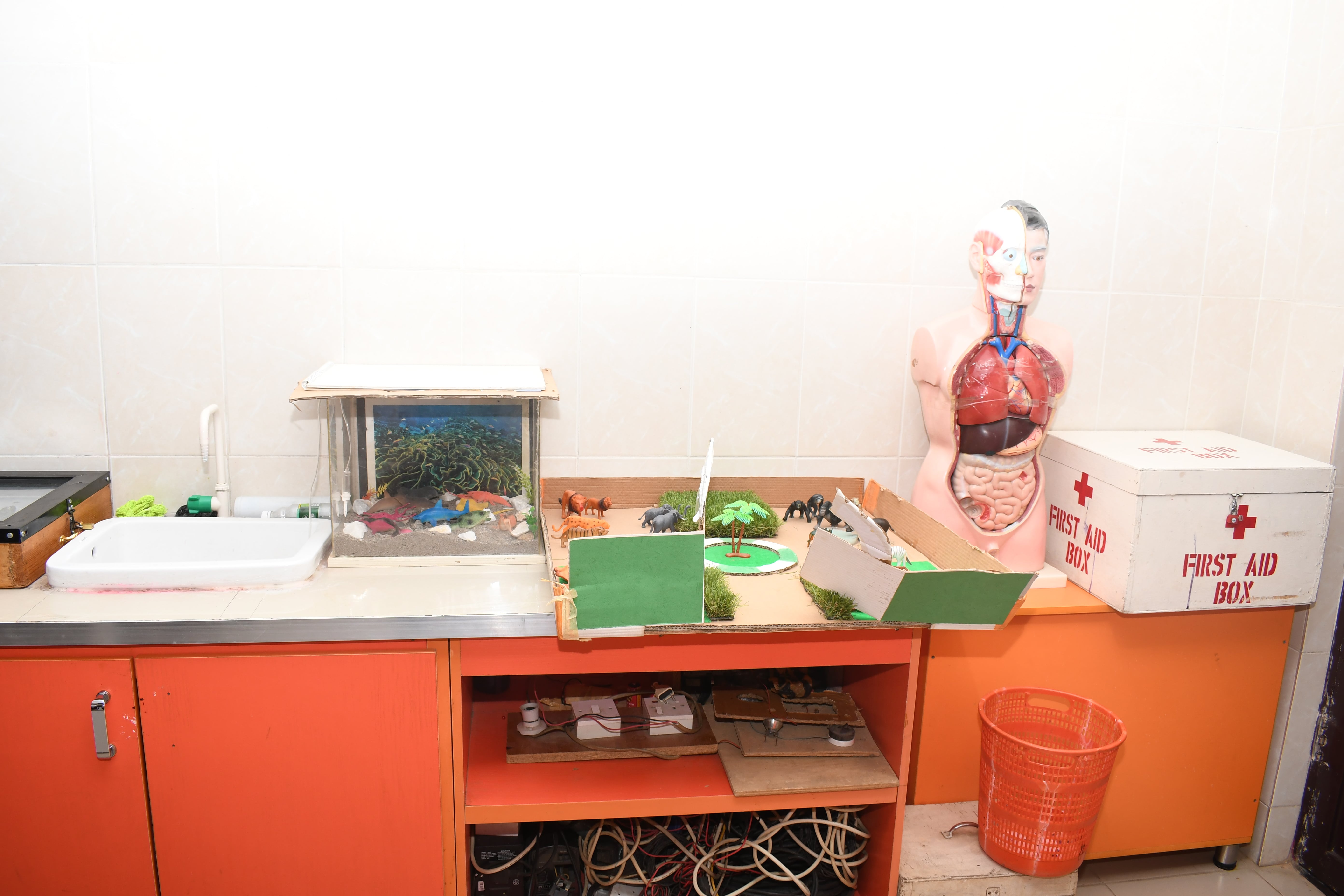 Children conducting experiments in Laboratory Club at Sunrice International School